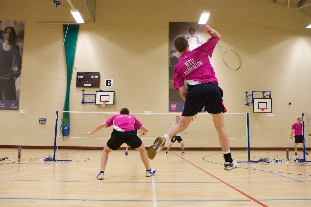 Men playing badminton 
