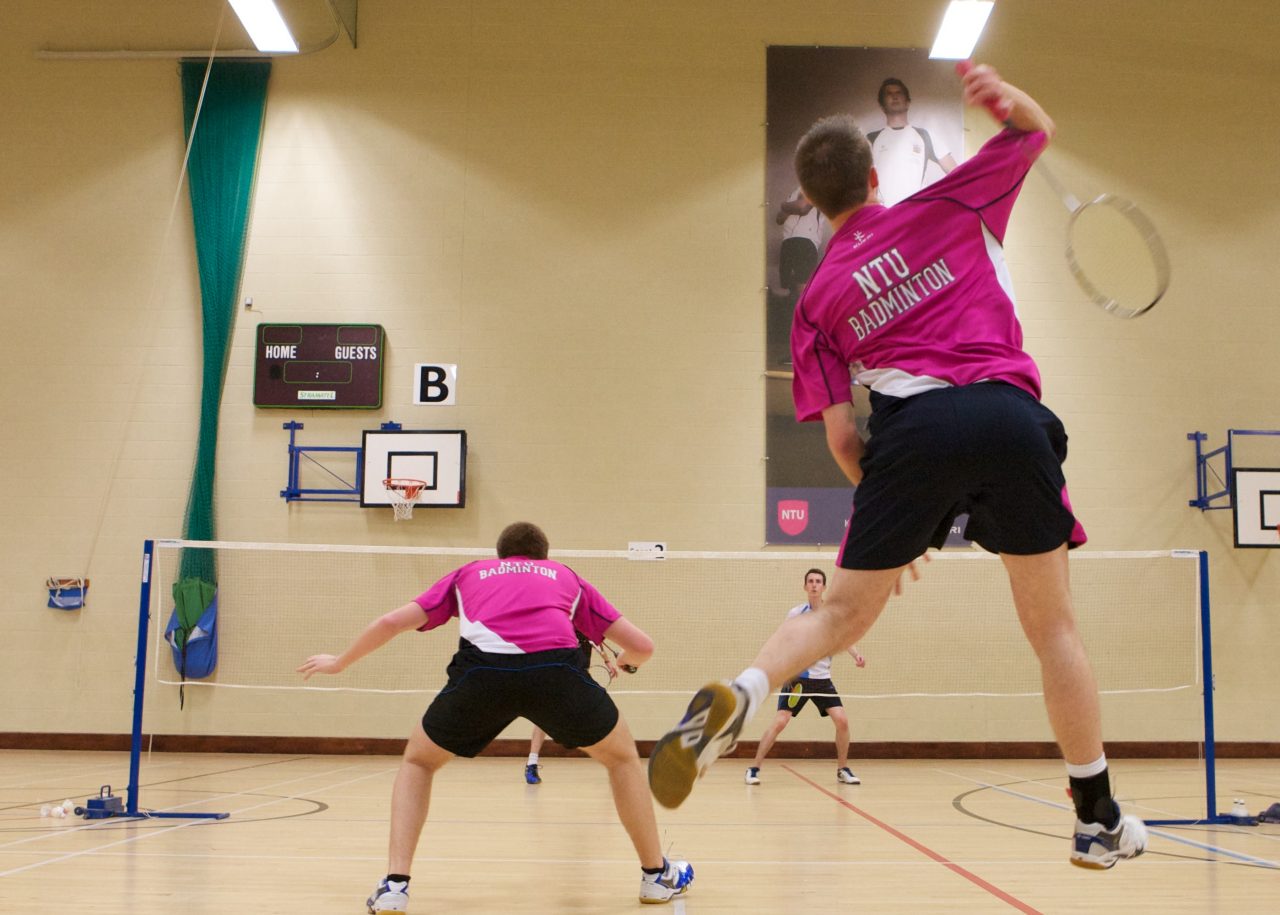 Men playing badminton 