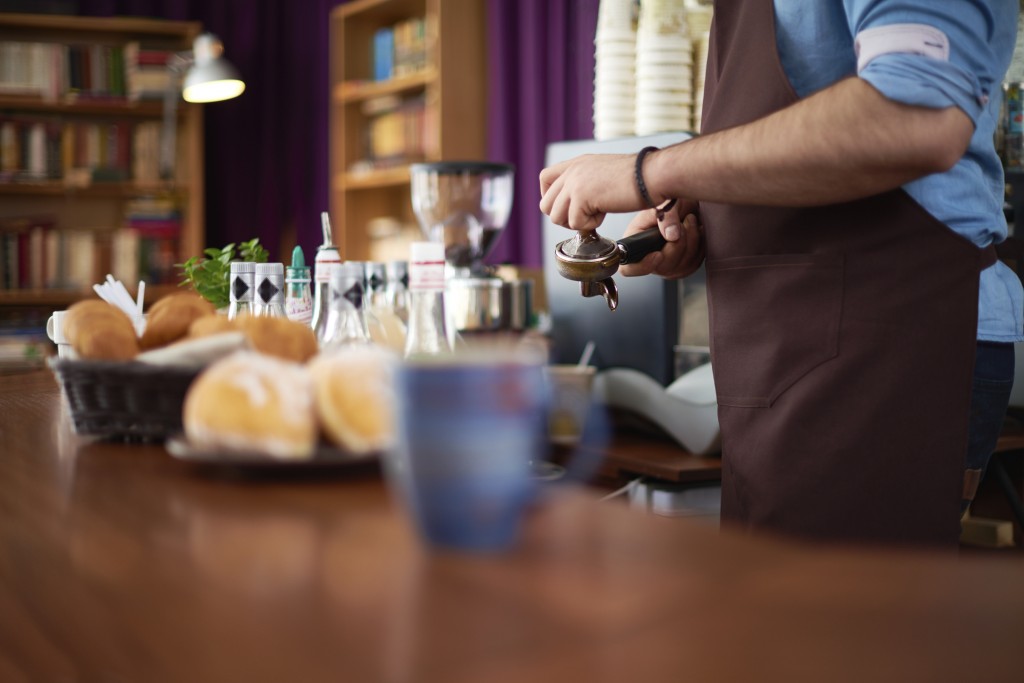 Barista working at a coffee bar