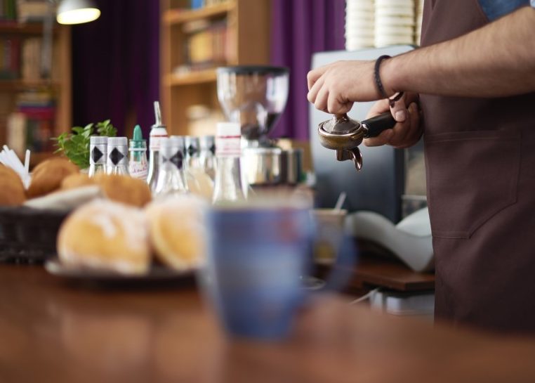 Barista working at a coffee bar