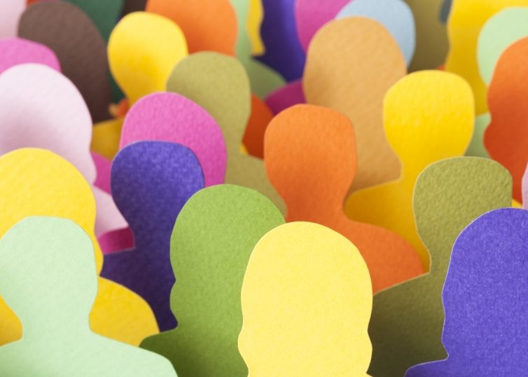 Paper cut outs of people in multiple colors