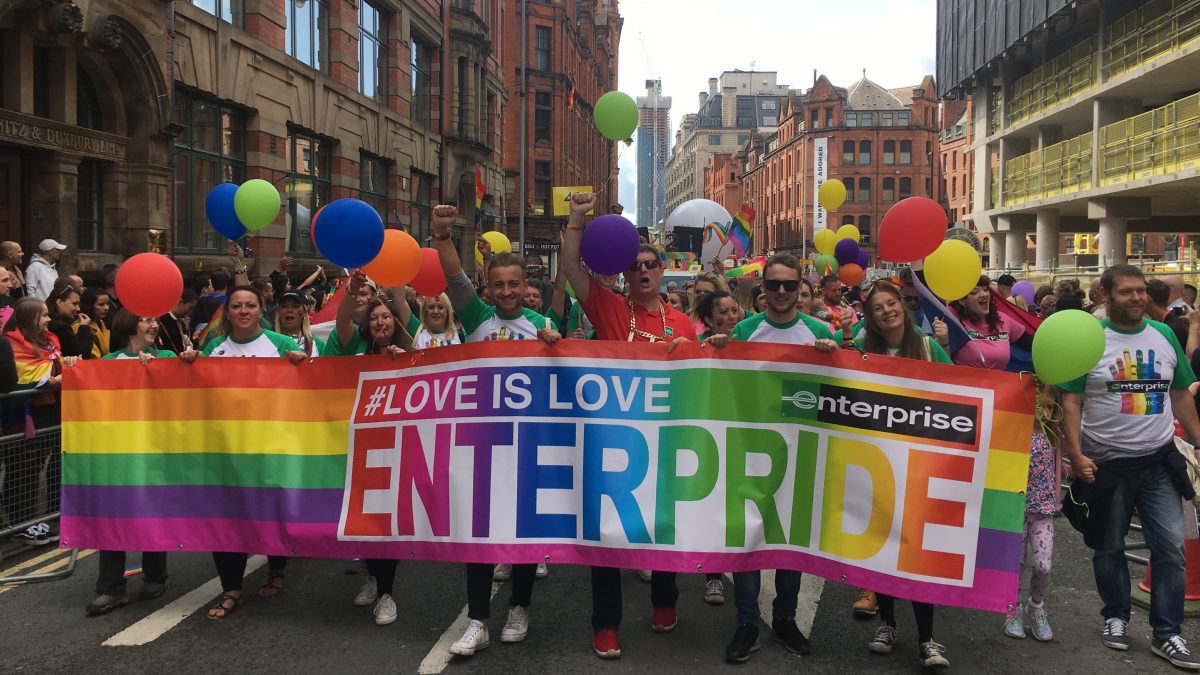 Enterprise employees holding the "Enterpride" banner at the Pride parade