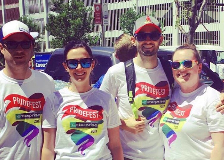 Group of people in Enterprise Pridefest 2017 t shirts