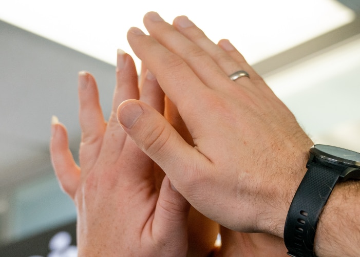 Group of hands in a high five