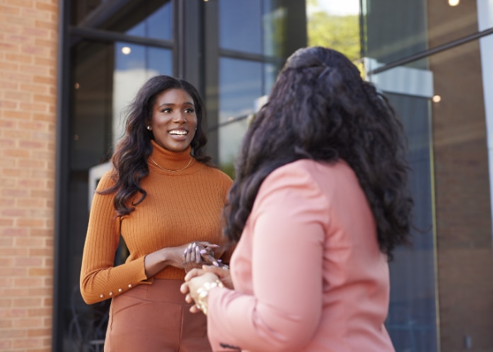 Enterprise Mobility members talking outside a career fair