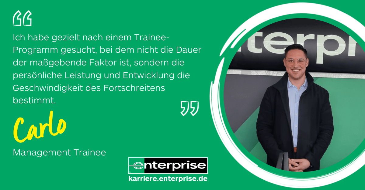 Man standing in front of Enterprise sign with a quote on a green background