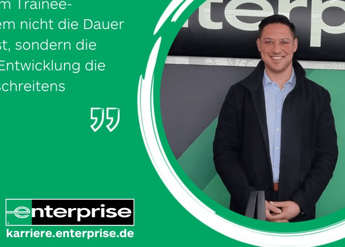 Man standing in front of Enterprise sign with a quote on a green background